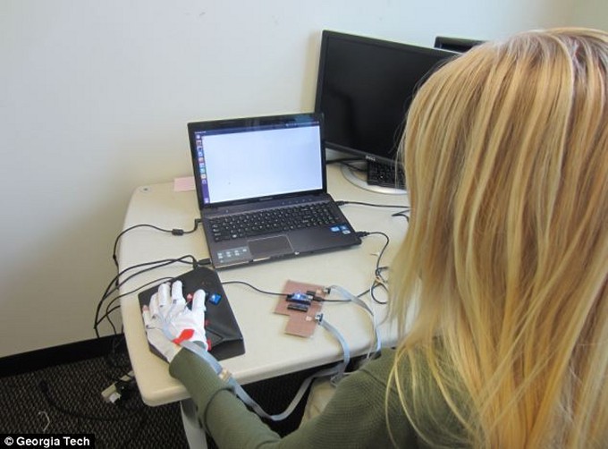 Vibrating Gloves Teach Braille in Minutes