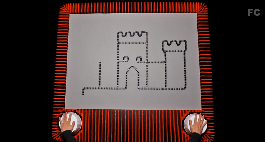 You’ve Got to See This Crazy, Stop Motion Etch A Sketch Made Entirely of Dominoes!