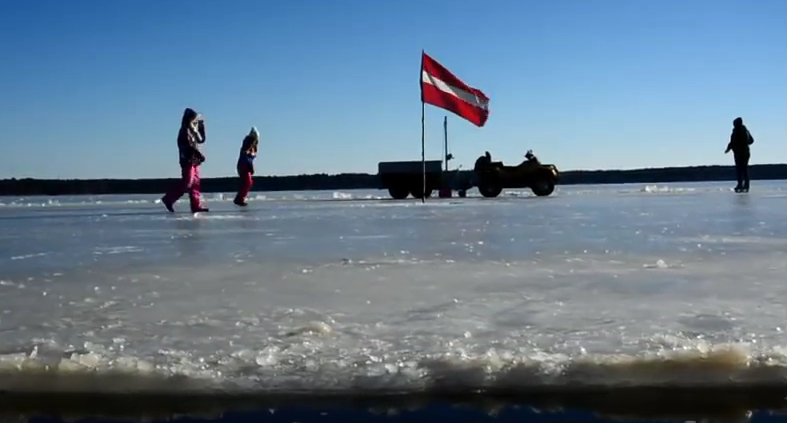 Chainsawing a Frozen Lake to Create an Ice Carousel Makes Winter Less Boring