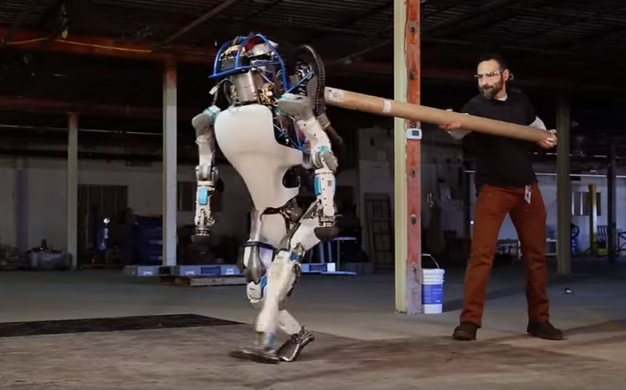 Atlas Robot From Boston Dynamics Works In a Warehouse and Gets Pushed Around