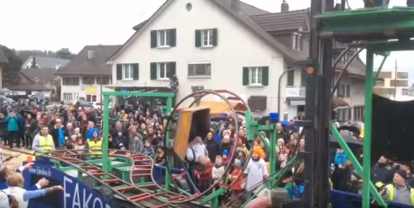 Festival Float in Switzerland is a Sketchy Roller Coaster Hitched to a Tractor