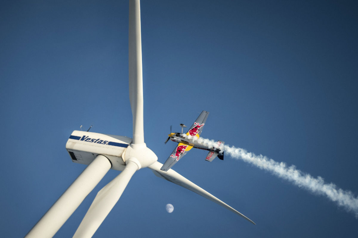 Red Bull Pilot Slaloms Through Austrian Wind Farm at 185 Miles Per Hour