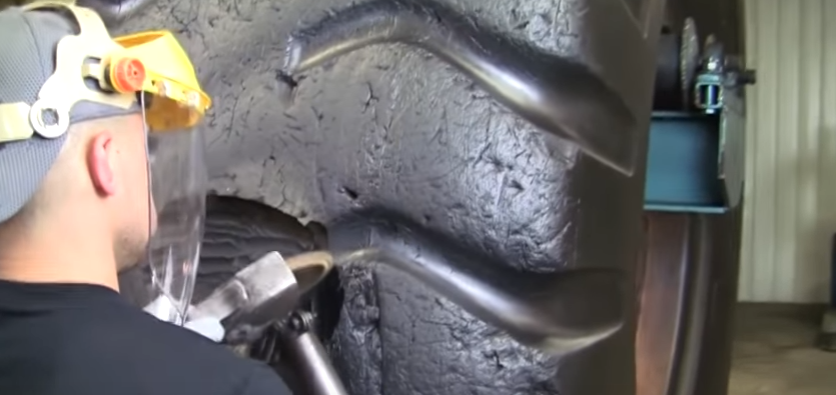 Watch All The Steps It Takes to Repair a $30,000 Earth Mover Tire