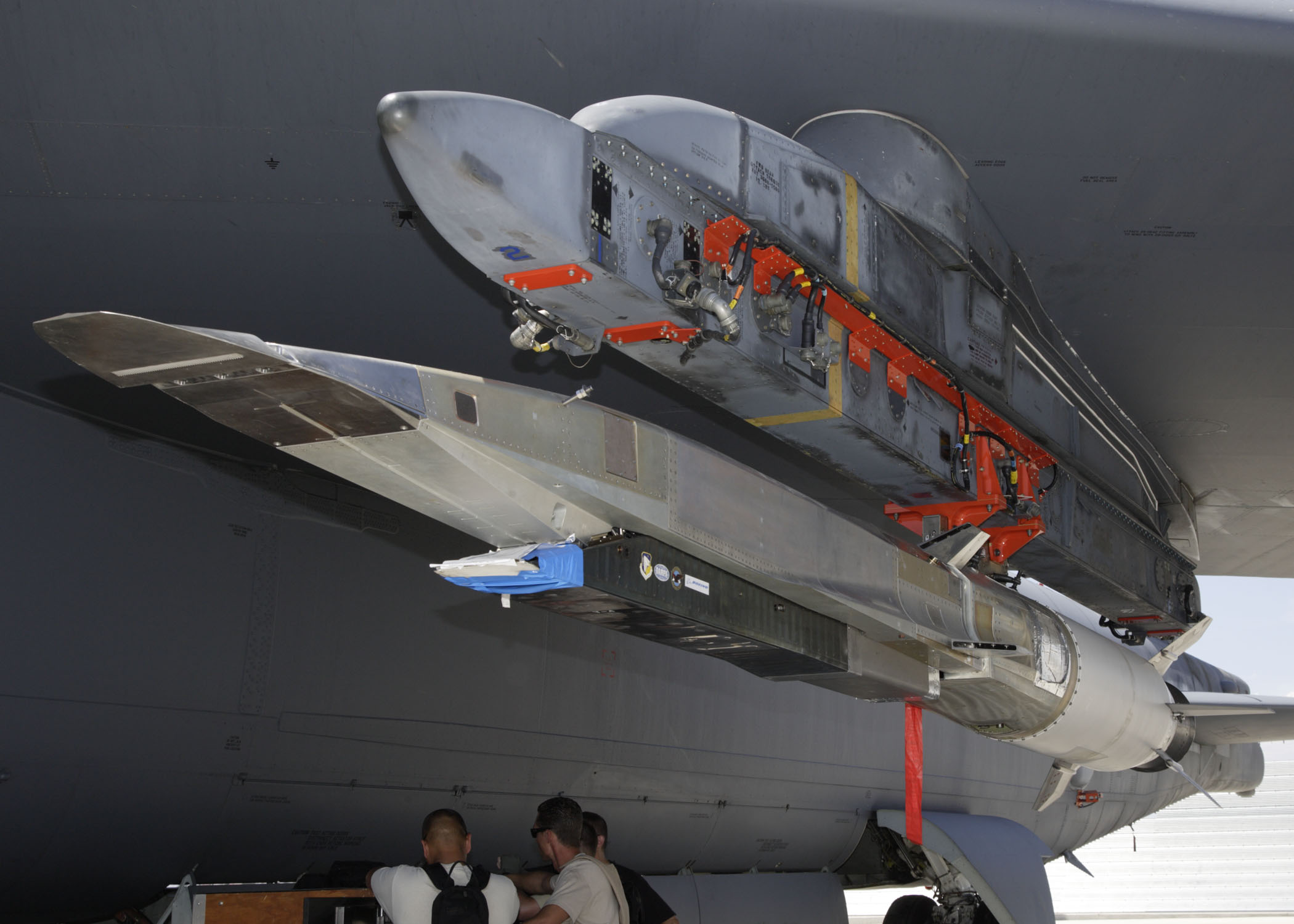 An X-51A WaveRider hypersonic flight test vehicle is uploaded to an Air Force Flight Test Center