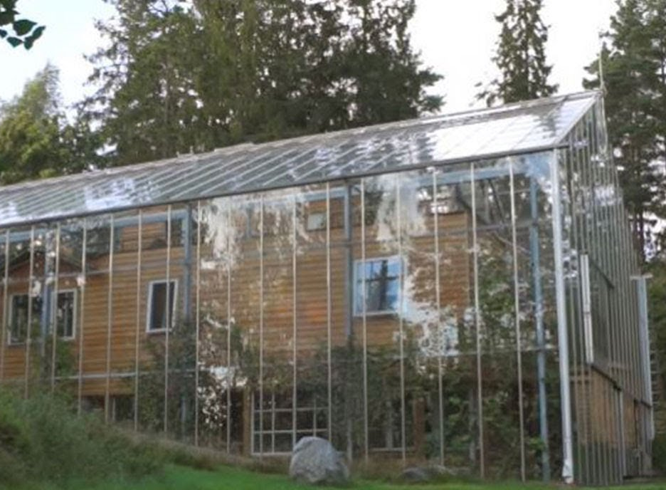 Swedish Couple Built a Glass House around Home to Keep Warm and Grow Food