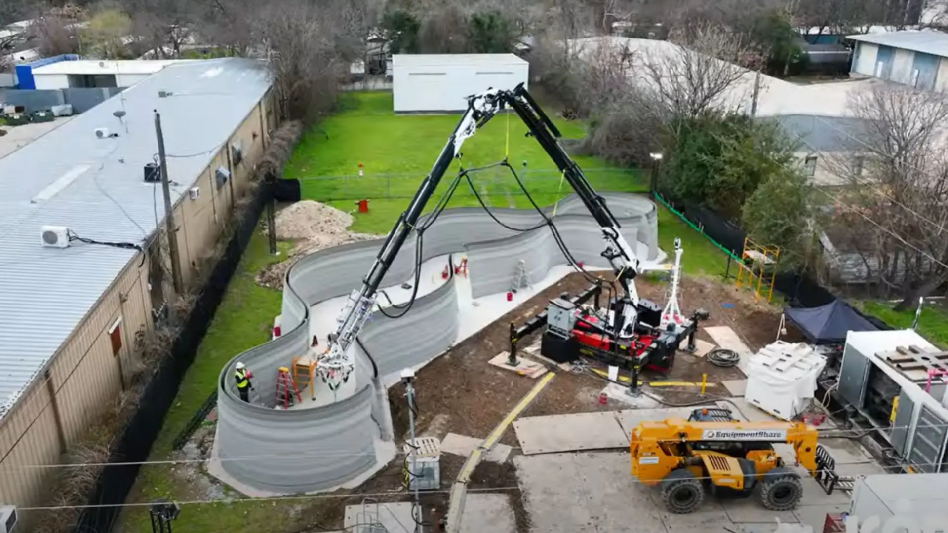 Unprecedented Feat: Massive Robotic Arm 3D Prints 27-ft-High Two-Story House